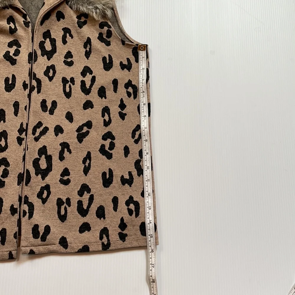 Cheetah print, tan & brown faux fur collared vest.  Girls size large + plus
